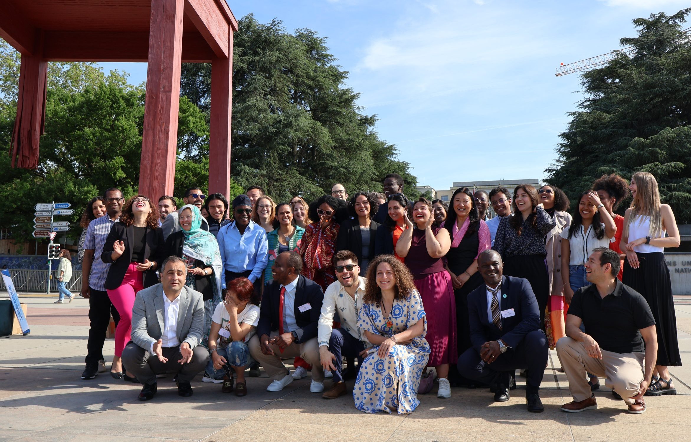 2024 Human Rights Defender Advocacy Programme (HRDAP) participants and ISHR staff in front of the UN building in Geneva ©ISHR